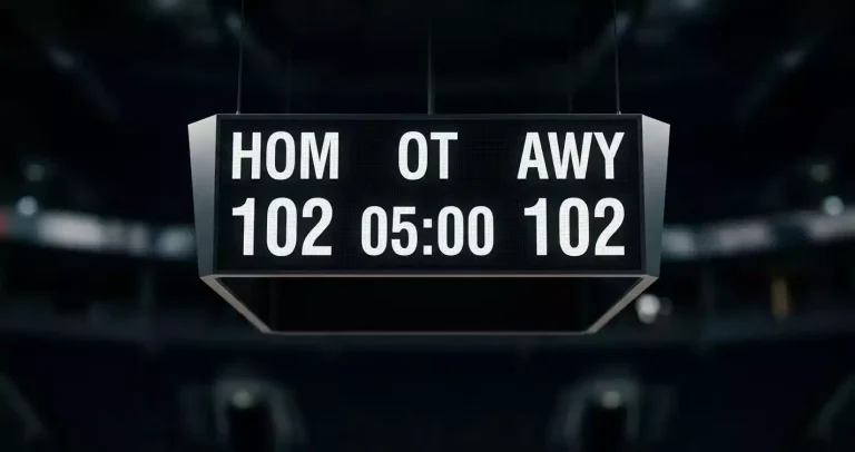 NBA arena scoreboard at the start of an overtime period with all zeros on the OT clock